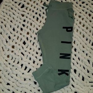 PINK Joggers. Olive green with black letter details. Drawstring waist pockets.